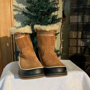 Sorel Tan and Black Winter Boots
